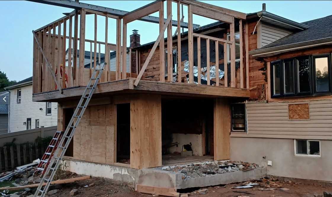 Siding installation and seamless gutter system installation on residential home in Linden New Jersey